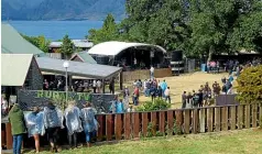  ??  ?? The beginning of the end . . . the crowd begins to trickle in to The Branding country music event at the Lake Hawea Hotel on New Year’s Eve December 31, 2014.