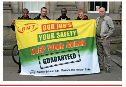  ?? PAUL BIGLAND. ?? RMT members stand outside Huddersfie­ld on April 28, during the latest walk-out by Northern staff over the introducti­on of Driver Controlled Operation (DCO).