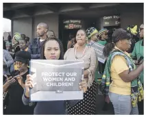  ?? Pictures: Jacques Nelles ?? OUTCRY. Top: Members from different political parties and the public protest outside the Pretoria Magistrate’s Court where a 20-year-old man, left, accused of raping a seven-year-old girl in the Dros restaurant in Silverton made his appearance yesterday.