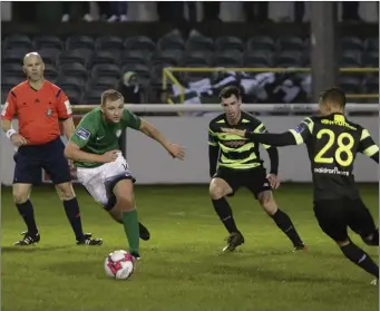  ??  ?? Bray’s Rhys Gorman faces Joel Coustrain and Graham Burke in a race for possession.