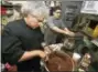  ?? CATHERINE AVALONE — REGISTER ?? Chef Arturo FrancoCama­cho prepares chocolate pavé.