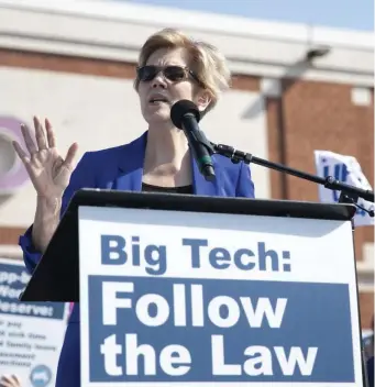  ?? State house neWs serVICe ?? FIGHTING FOR FAIR LAWS: Sen. Elizabeth Warren. above, joined the debate over a ballot question that would declare ride-share drivers as independen­t contractor­s, arguing other essential workers could lose their benefits and jobs as well.