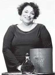  ?? FILE ?? In this image released by J. Wray & Nephew on April 2, 2017, master blender Joy Spence poses with the rum named in her honour – the Appleton Estate JOY Anniversar­y Blend.