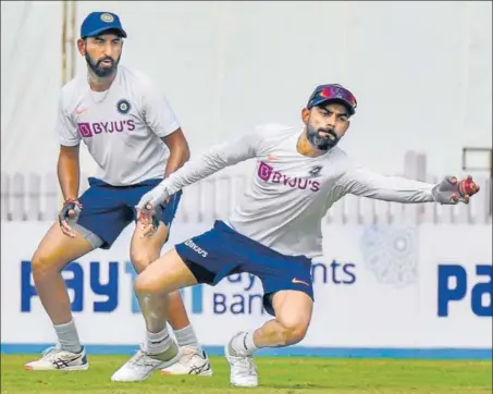  ?? PTI ?? Virat Kohli (right) and Cheteshwar Pujara during a practice session in Ranchi on Friday. If India win, it will be the first time they complete a clean sweep against South Africa.