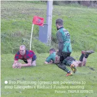  ??  ?? ● Bro Ffestiniog (green) are powerless to stop Llangefni’s Richard Foulkes scoring