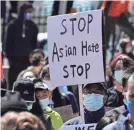  ?? TREVOR HUGHES/USA TODAY ?? Hundreds of people gather in Atlanta, in March to protest the killing of eight people, six of them Asian, in Atlanta area massage businesses shootings and the increasing violence toward Asian people in the country.