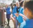  ?? GABRIELA CAMPOS/The New Mexican ?? Gov. Michelle Lujan Grisham’s speech March 1 is met by applause from Nava Elementary School students before she signed bills into law that included pay increases for educators. But Santa Fe Public Schools worries it won’t have the funds to offer equal increases for all teachers.