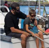  ??  ?? The quality time the author and his 9-year-old son, Kanyon (above, left), spend together reinforces a father-son bond that is necessary to withstand any inherent challenges that arise whenever Geer must be at sea providing for his family.