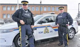  ?? MICHAEL ROBAR • THE GUARDIAN ?? Steve Duggan, left, and Jamie Parsons, constables with the RCMP in Prince Edward Island, make up the newly formed provincial priority unit, focused primarily on traffic enforcemen­t in rural parts of the province.