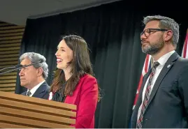  ?? ROSA WOODS/STUFF ?? At the top table: Iain Lees-galloway, right, with Jacinda Ardern and Winston Peters, announcing New Zealand is raising its annual refugee quota.