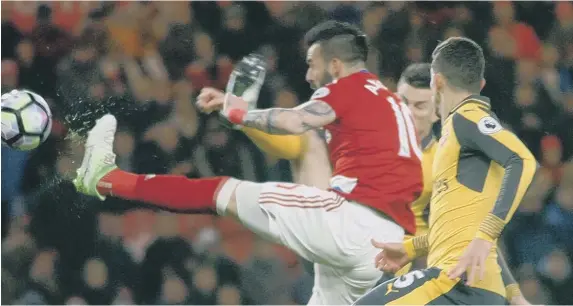  ??  ?? Alvaro Negredo stretches to reach the ball. Pictures by Tom Collins.