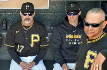  ?? Matt Freed/Post-Gazette ?? The organizati­on of spring training 2.0 would fall to bench coach Don Kelly, middle, just as the PIrates’ time in their Bradenton, Fla., camp did.