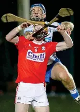  ??  ?? Fast and furious: Conor Cahalane of Cork and Waterford’s Michael Walsh battle under the bigh ball last night