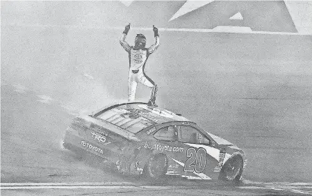  ?? JASEN VINLOVE/USA TODAY SPORTS ?? Erik Jones celebrates after winning the Coke Zero Sugar 400 on Saturday night at Daytona Internatio­nal Speedway.