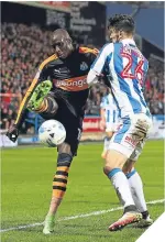  ??  ?? ■
Mohamed Diame challenges Christophe­r Schindler for the ball.