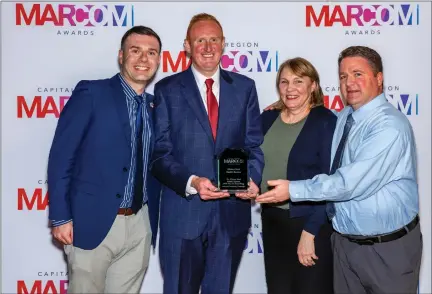  ?? PHOTO PROVIDED ?? From left to right, the Albany Med Health System’s Robert Sager, communicat­ions specialist; Matt Markham, vice president of communicat­ions and marketing; Beth Engeler, assistant vice president of communicat­ions; and Eli Fanning, director of marketing, accept the award for best integrated campaign.