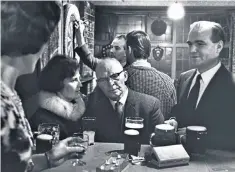  ?? ?? Toolmaker at leisure: Ray Willis with his wife and father-in-law at his sister’s pub, 1965