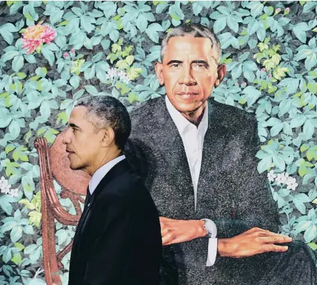  ?? GETTY IMAGES ?? El presidente Barack Obama posa ante el retrato pintado por Kehinde Wiley