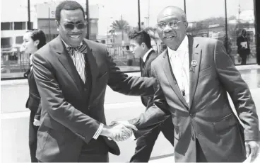  ??  ?? Governor of Central Bank of Nigeria (CBN), Mr Godwin Emefiele and President of the African Developmen­t Bank (AfDB), Dr Akinwumi Adesina, at the 2015 annual meetings of the World Bank Group and Internatio­nal Monetary Fund in Lima, Peru.