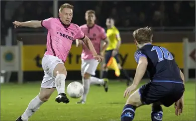  ??  ?? Chris Kenny of Wexford Youths controls the ball as Gareth McCaffrey (Drogheda United) looks on.