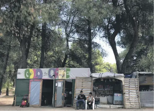  ??  ?? Above, the Gold Cafe offers routine, coffee and a chat. Left, Syrian Riad Dawood, 45, comes to the cafe to escape from his caravan. Right, Yaqoob Fatayer, 23, expects a long wait to be placed