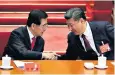  ??  ?? Xi Jinping, right, shakes hands with Hu Jintao, the country’s former president