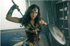  ??  ?? Gal Gadot is sensitive and strong as Wonder Woman.