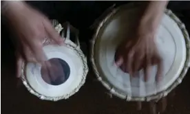  ?? Photograph: Saurabh Das/AP ?? Beating the drum for Afghan culture … a student practises the tabla at the Afghanista­n National Institute of Music in Kabul in 2010.