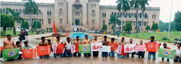  ??  ?? Representa­tives of student unions at Osmania University protest by removing their shirts at the Arts College campus in Hyderabad in support of the ongoing agitation by the RTC employees on Wednesday.