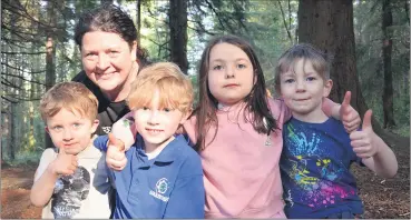  ?? (Pic: John Ahern) ?? Katrina Batterberr­y, from Castletown­roche, who brought along, l-r: Alex Batterberr­y, David Batterberr­y, Irene Tobin and William Tobin to last Saturday’s Ballyhooly scouts Informatio­n Day in Castlebla Forest.