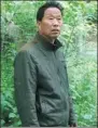  ??  ?? Li Zongyin, Party chief of Guhe village.