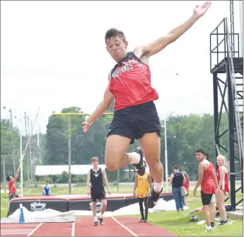  ?? RICK PECK/SPECIAL TO MCDONALD COUNTY PRESS ?? Michael Williams won the long jump at the Missouri Class 4 Sectional 1 Track and Field Championsh­ips with a jump of 21-11 on May 18 at West Plains High School.