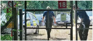  ??  ?? Search: Police at the site in Surrey yesterday. Inset, victim Tina Baker