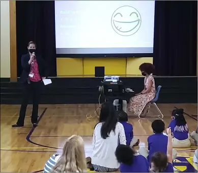  ?? PHOTO BY MELISSA SCHUMAN ?? Principal Klopott addresses the students of PS 2during an assembly.