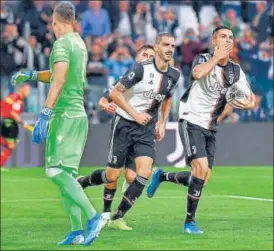  ?? AP ?? ■ Juventus' Cristiano Ronaldo celebrates after converting a penalty against Verona.