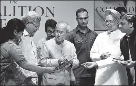  ?? SONU MEHTA/HT PHOTO ?? (From left) DMK leader Kanimozhi, CPI(M) general secreatry Sitaram Yeachury, former President Pranab Mukherjee, former PM Manmohan Singh and former Uttar Pradesh chief minister Akhilesh Yadav during the book release at Teen Murti Bhawan in New Delhi on...