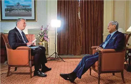  ?? AP PIC ?? Prime Minister Tun Dr Mahathir Mohamad being interviewe­d by Associated Press Asia Pacific news director Adam Schreck in Putrajaya yesterday.