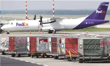  ??  ?? A Fedex ATR 72-200F cargo plane awaits loading at Vaclav Havel Airport in Prague, Czech Republic. — Reuters photo