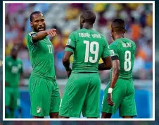  ??  ?? Golden generation… two JMG academy graduates, Yaya Toure and Salomon Kalou, at the 2014 World Cup with Didier Drogba