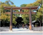  ??  ?? MEIJI JINGU SHRINE The city’s largest and most famous Shinto shrine is located within a lush forest park in the Shibuya district. Pass under the enormous Torii Gate and up a long, tree-lined avenue, pausing for pictures next to panels of giant sake...