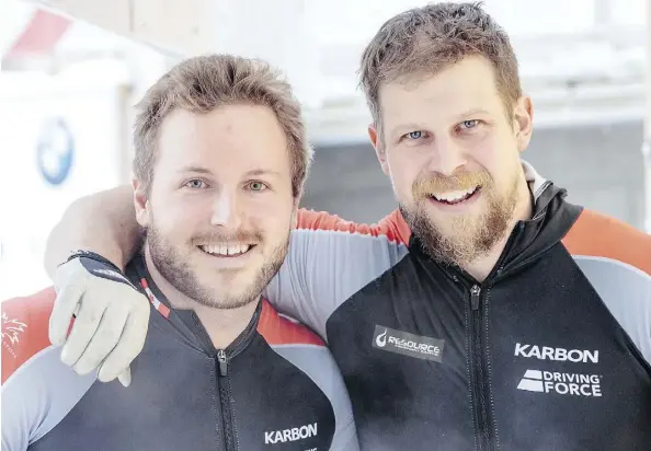  ?? JOHANN GRODER/GETTY IMAGES ?? Justin Kripps, left, and Jesse Lumsden celebrate their silver medal in the World Cup two-man bobsled event in Igls, Austria, on Saturday. They also won silver with a four-man crew Sunday.