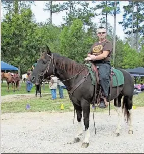  ?? CONTRIBUTE­D PHOTO ?? Jay Camp and Rio are ready to ride for St. Jude.