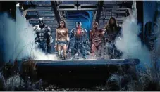  ??  ?? Getting busy in the film Justice Leagure are (from left) Ben Affleck, Gal Gadot, Ray Fisher, Ezra Miller and Jason Momoa.