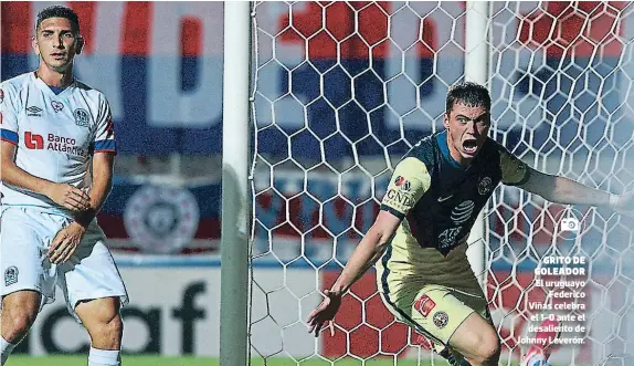  ??  ?? grito de goleador El uruguayo Federico Viñas celebra el 1-0 ante el desaliento de Johnny Leverón.