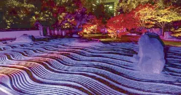  ??  ?? Light and sand: The Zen garden of Jotenji Temple in Fukuoka is lit up at night for the Hakata Light Up Walk. Photo from Showcase.city.fukuoka.lg.jp