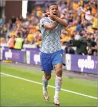  ?? Nick Potts / Associated Press ?? Manchester United’s Mason Greenwood celebrates after scoring against Wolverhamp­ton on Sunday.