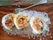  ?? 1921 BY NORMAN VAN AKEN ?? Oysters at 1921 by Norman Van Aken, run by the wellknown Florida chef of the same name.