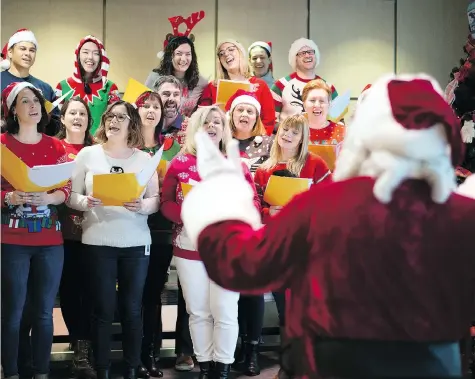  ?? TROY FLEECE ?? The SGI Not-ready-for-christmast­ime Singers donned ugly Christmas sweaters on Friday and belted out not-so-classic holiday tunes to bring attention to the December Traffic Safety Spotlight on impaired driving.