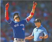  ?? JAYNE KAMIN- ONCEA/ USA TODAY SPORTS ?? Lourdes Gurriel Jr. had a monster game for the Toronto Blue Jays Sunday in Anaheim, driving in five runs — including the eventual winning run — as the Jays beat the Angels 11-10.