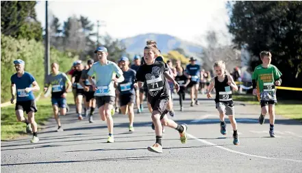  ??  ?? Harvey Newman (71 shirt), forces the pace in last year’s Seddon School Tussock Run.